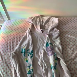 Thin light pink hoodie with flower decals